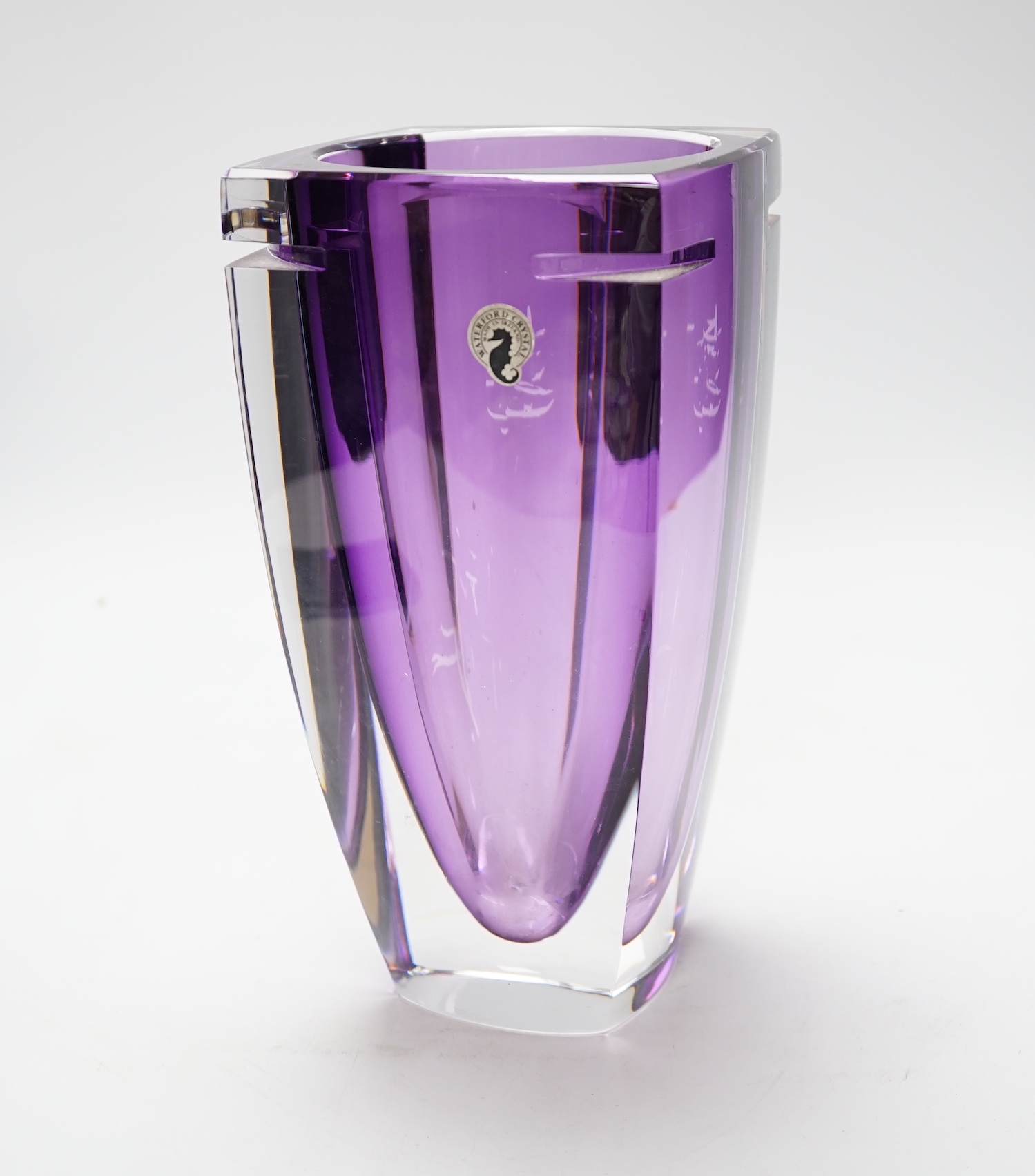 A Waterford amethyst stained square section glass vase, 24.5cm